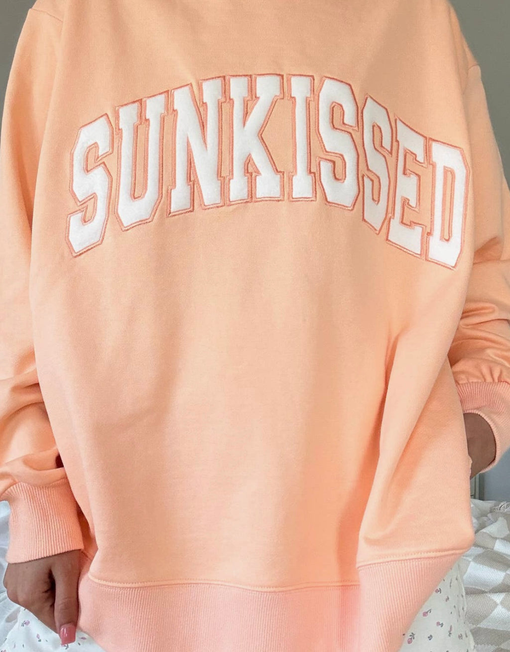 Sun-kissed mock neck